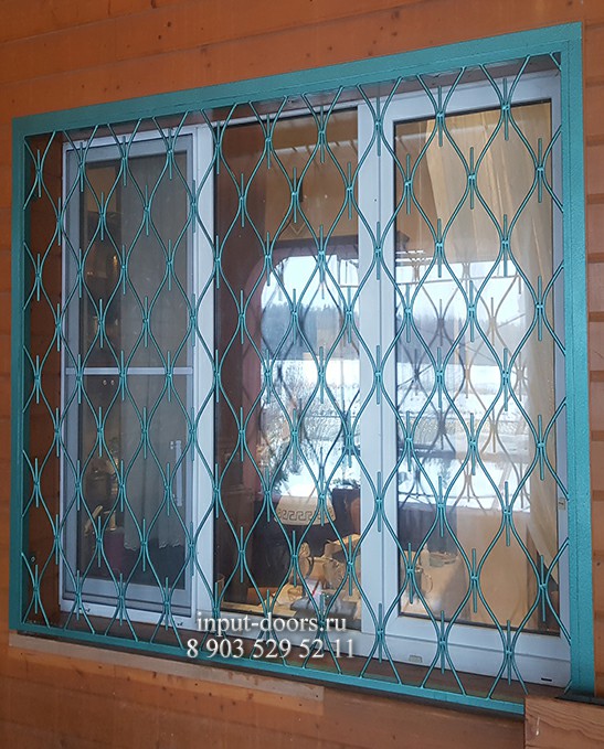 Сварная решетка на окно с окрасом hammerite
